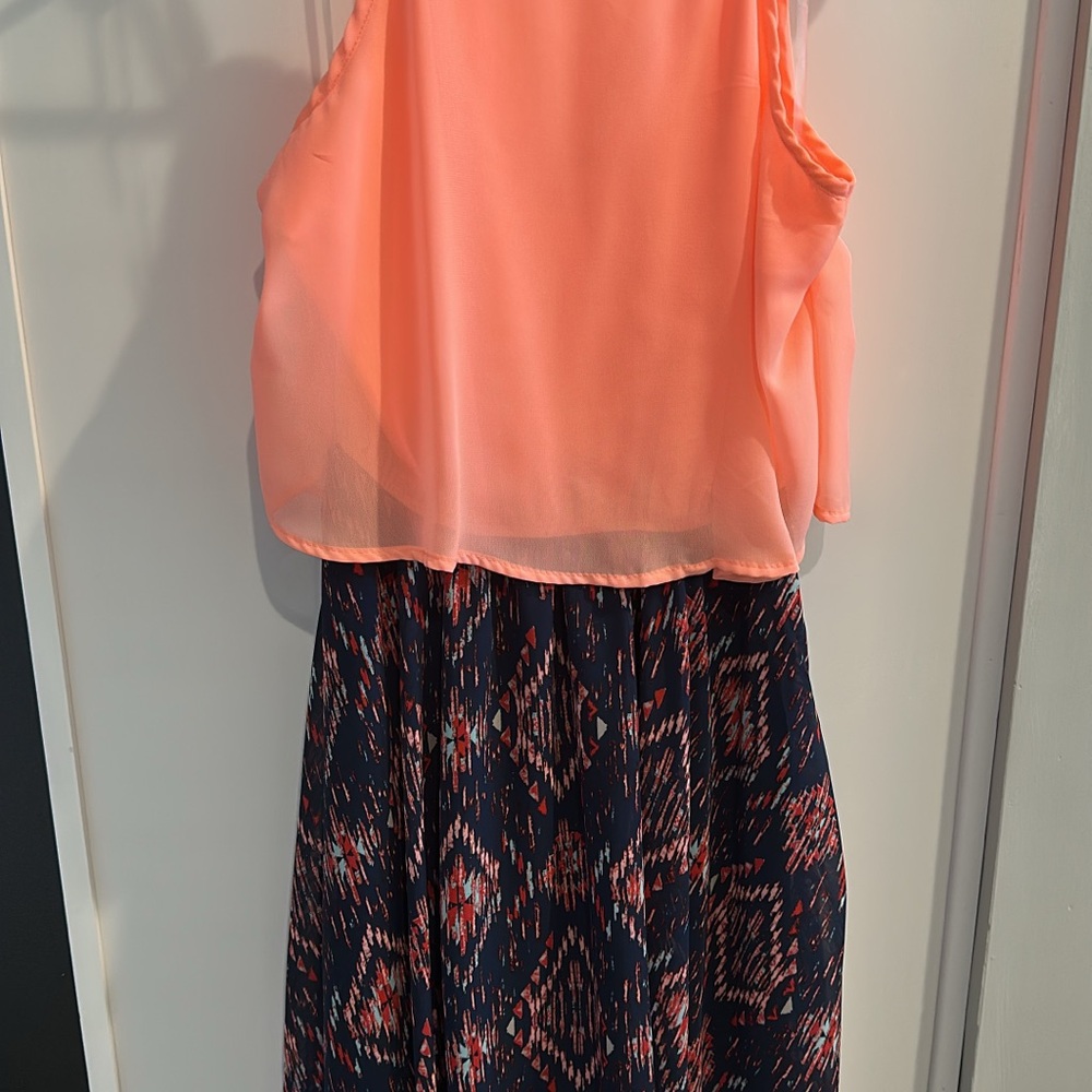 Coral Sleeveless Top with Patterned Skirt